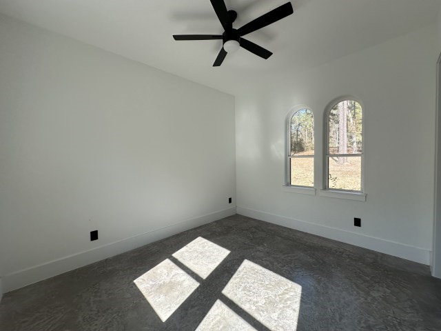 875 Lonestar Road Huntsville, TX 77340 - Photo 19 of 24 a view of an empty room with a window