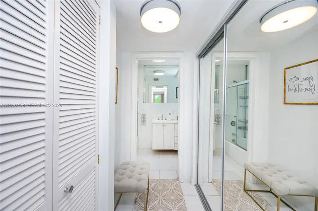 a view of a hallway with elevator and door