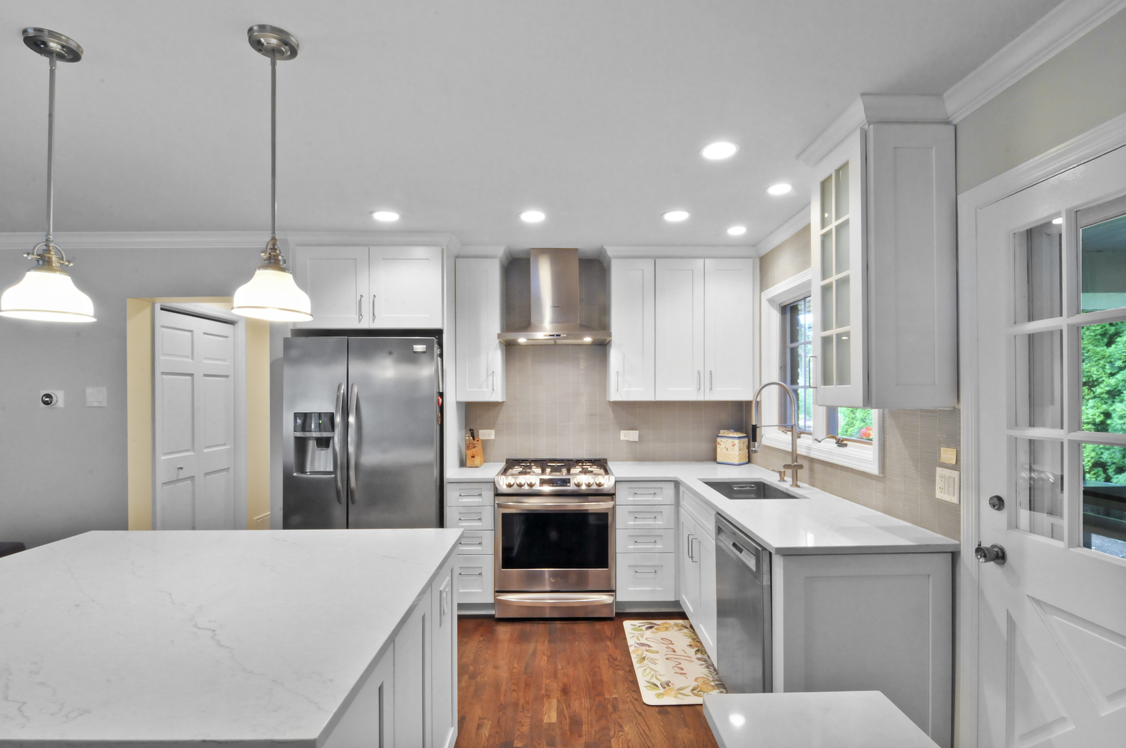 1133 Dell Road Northbrook, IL 60062 - Photo 3 of 6 a kitchen with a refrigerator sink and stove