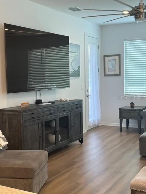7978 Southwest 90th Terrace Ocala, FL 34481 - Photo 6 of 20 a kitchen with stainless steel appliances granite countertop a stove a sink and a microwave