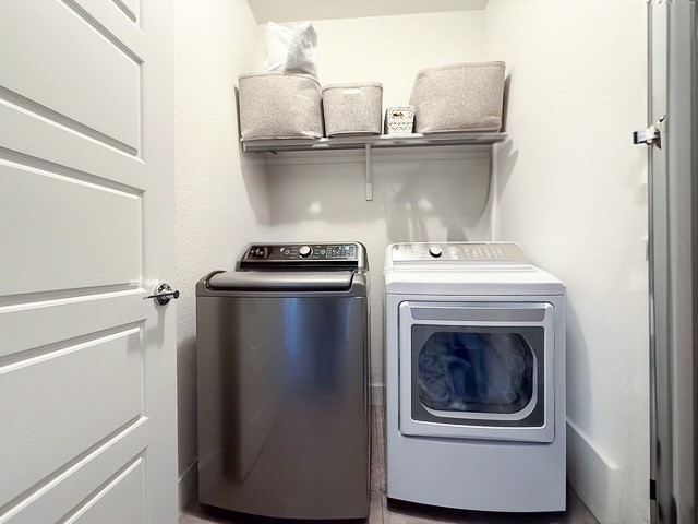 1805 Roseburg Drive, Unit 31 Austin, TX 78754 - Photo 14 of 19 a close up view of a washer and dryer