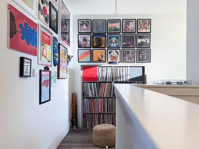 a bathroom with a sink vanity and a toilet