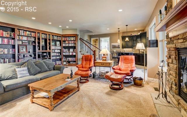 4875 Seton Hall Road Colorado Springs, CO 80918 - Photo 25 of 33 Family Room with Cozy Fireplace