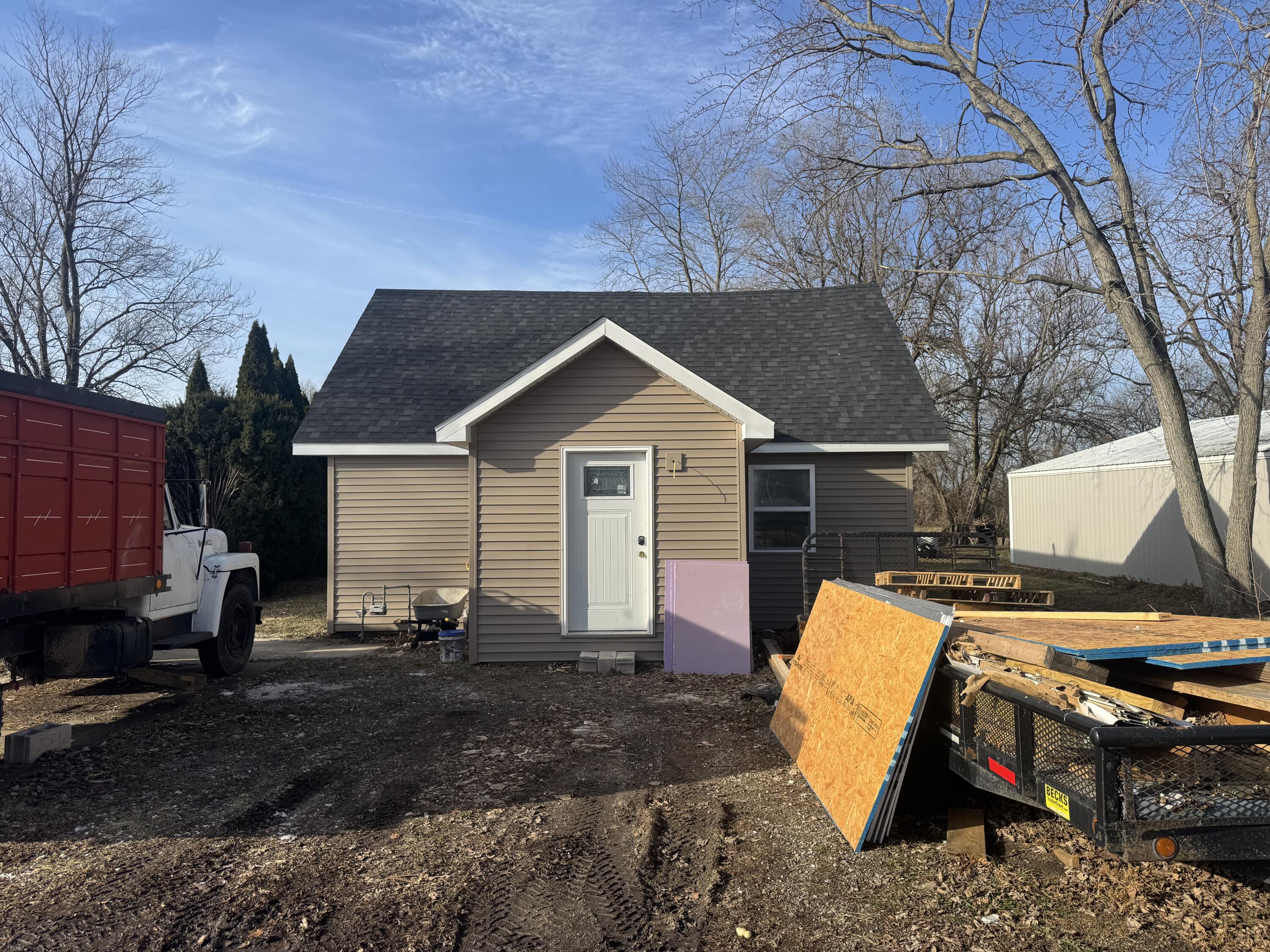 608 Essen Street Brook, IN 47922 - Photo 1 of 7 a view of a house with backyard