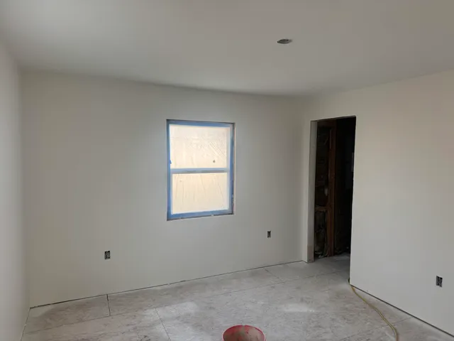 an empty room with a window