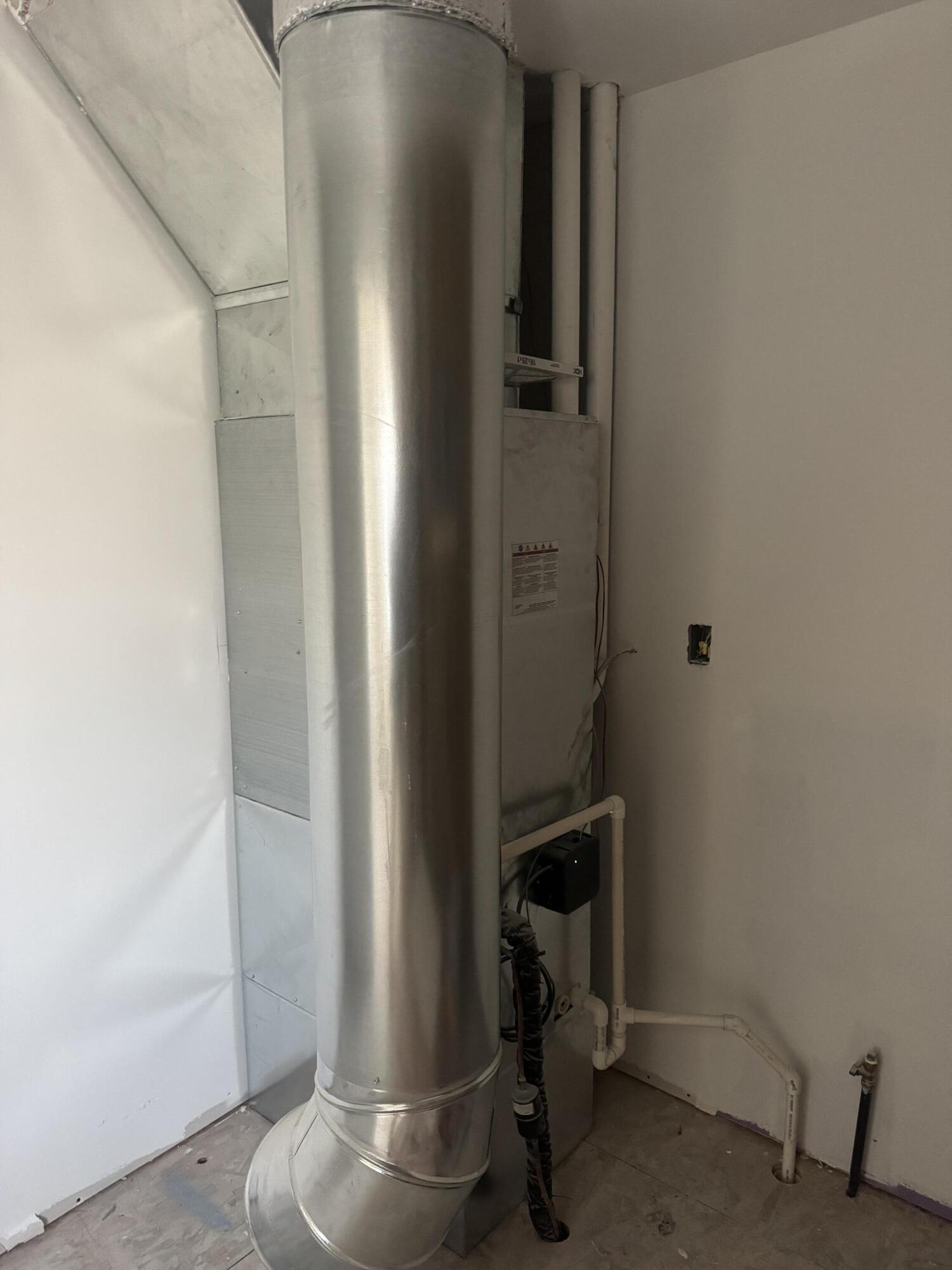 608 Essen Street Brook, IN 47922 - Photo 7 of 7 a room with water heater and storage