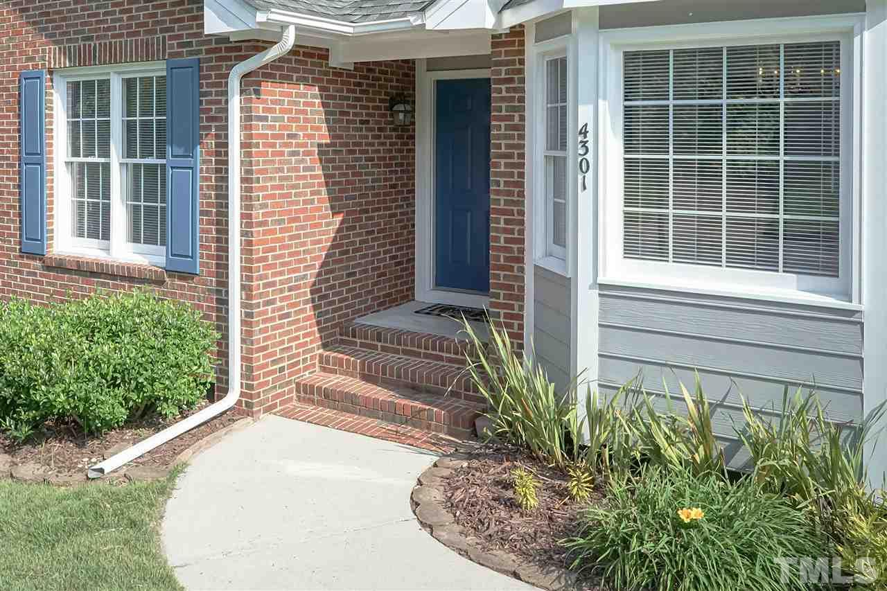4301 Willow Lake Road Raleigh, NC 27616 - Photo 3 of 30 a plant is in front of a house