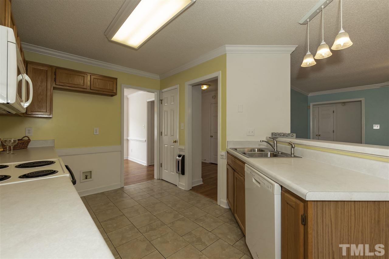 4301 Willow Lake Road Raleigh, NC 27616 - Photo 10 of 30 a bathroom with a sink a toilet and shower