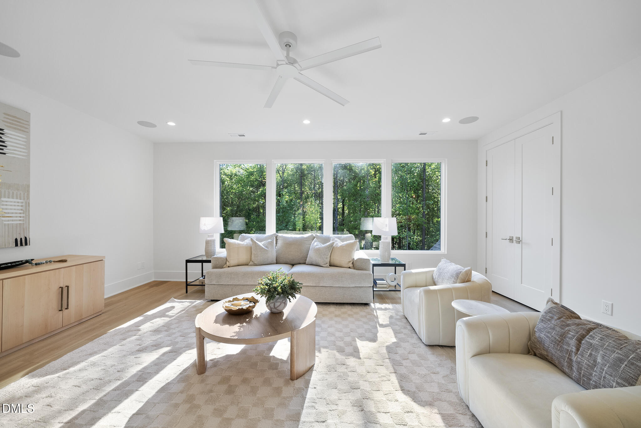 7608 Falls Creek Lane Raleigh, NC 27614 - Photo 46 of 74 a living room with furniture and a large window