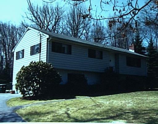 5 Crown Hill Road Newtown, CT 06482 - Photo 1 of 1 a backyard of a house with lots of green space