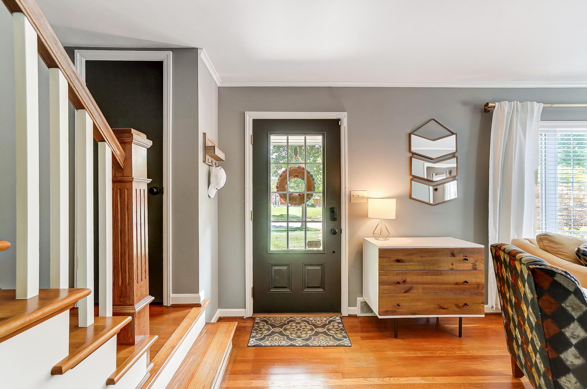 1539 Cardiff Road Columbus, OH 43221 - Photo 4 of 45 The gleaming hardwood floors and the built ins make this entry space special.