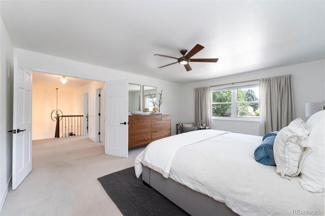 a bathroom with a double vanity sink mirror double and shower