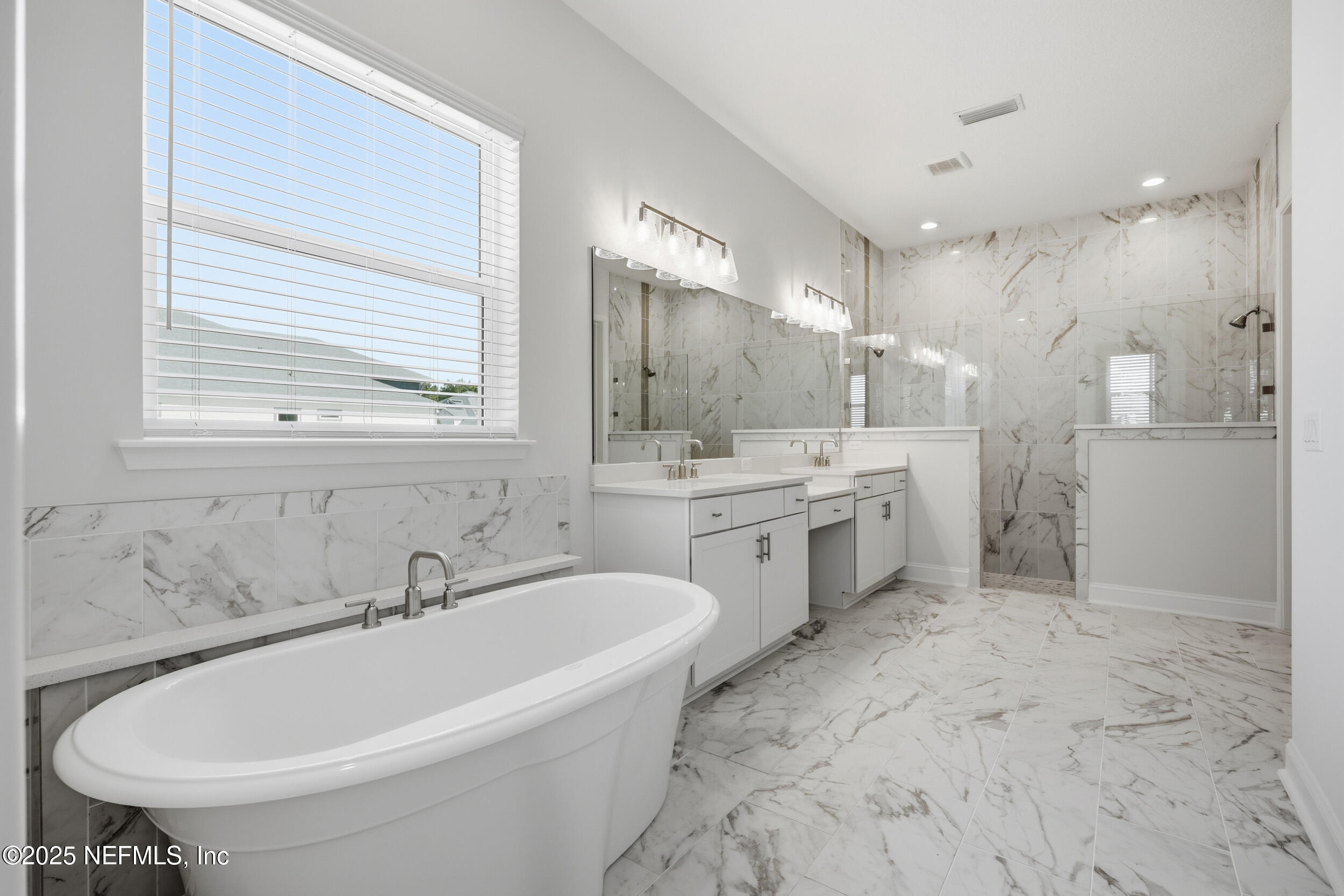 23 Owl Lndg Way St. Augustine, FL 32092 - Photo 16 of 19 a bathroom with a bathtub and a sink