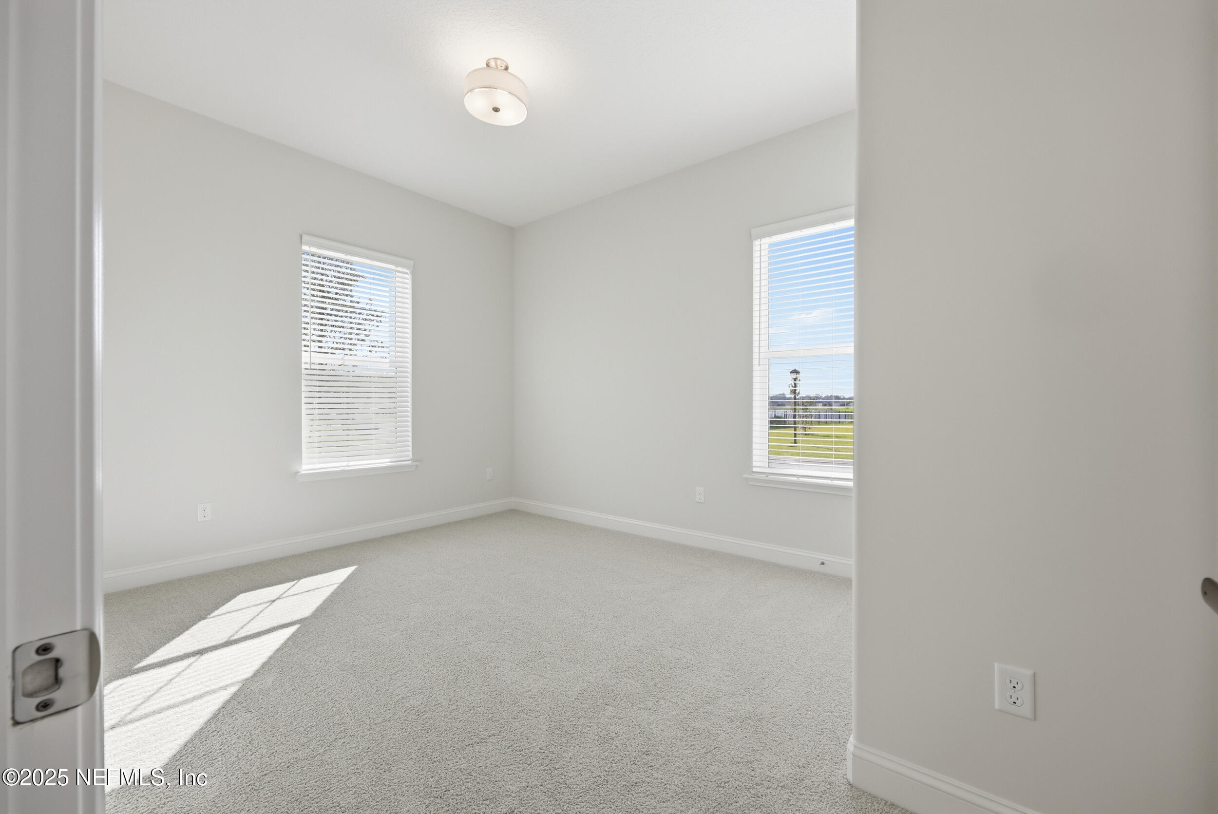 23 Owl Lndg Way St. Augustine, FL 32092 - Photo 18 of 19 an empty room with windows