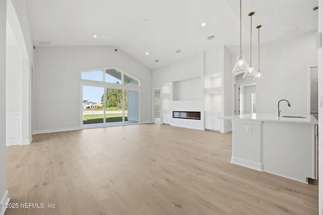a view of a kitchen and window