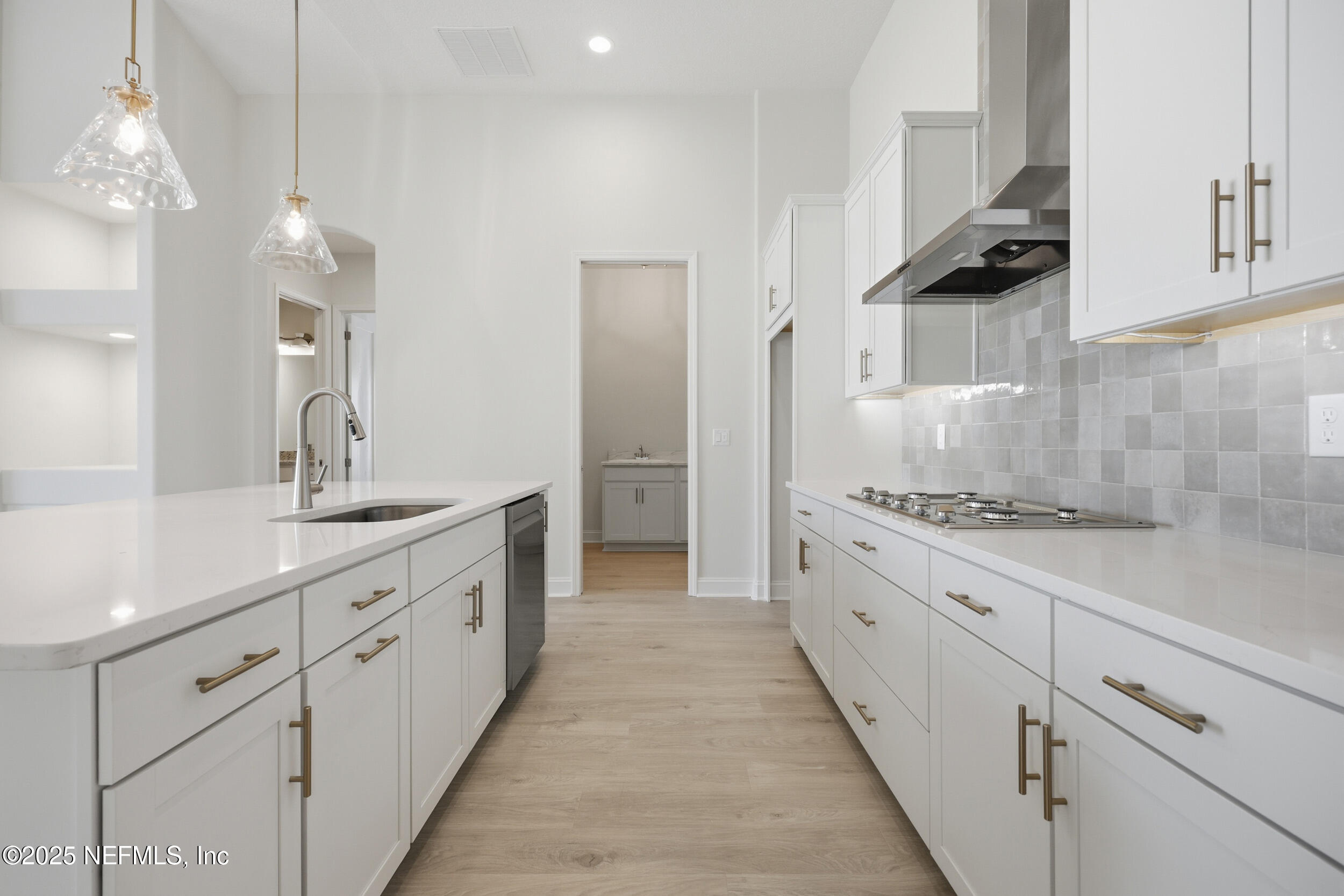 23 Owl Lndg Way St. Augustine, FL 32092 - Photo 10 of 19 a large kitchen with cabinets