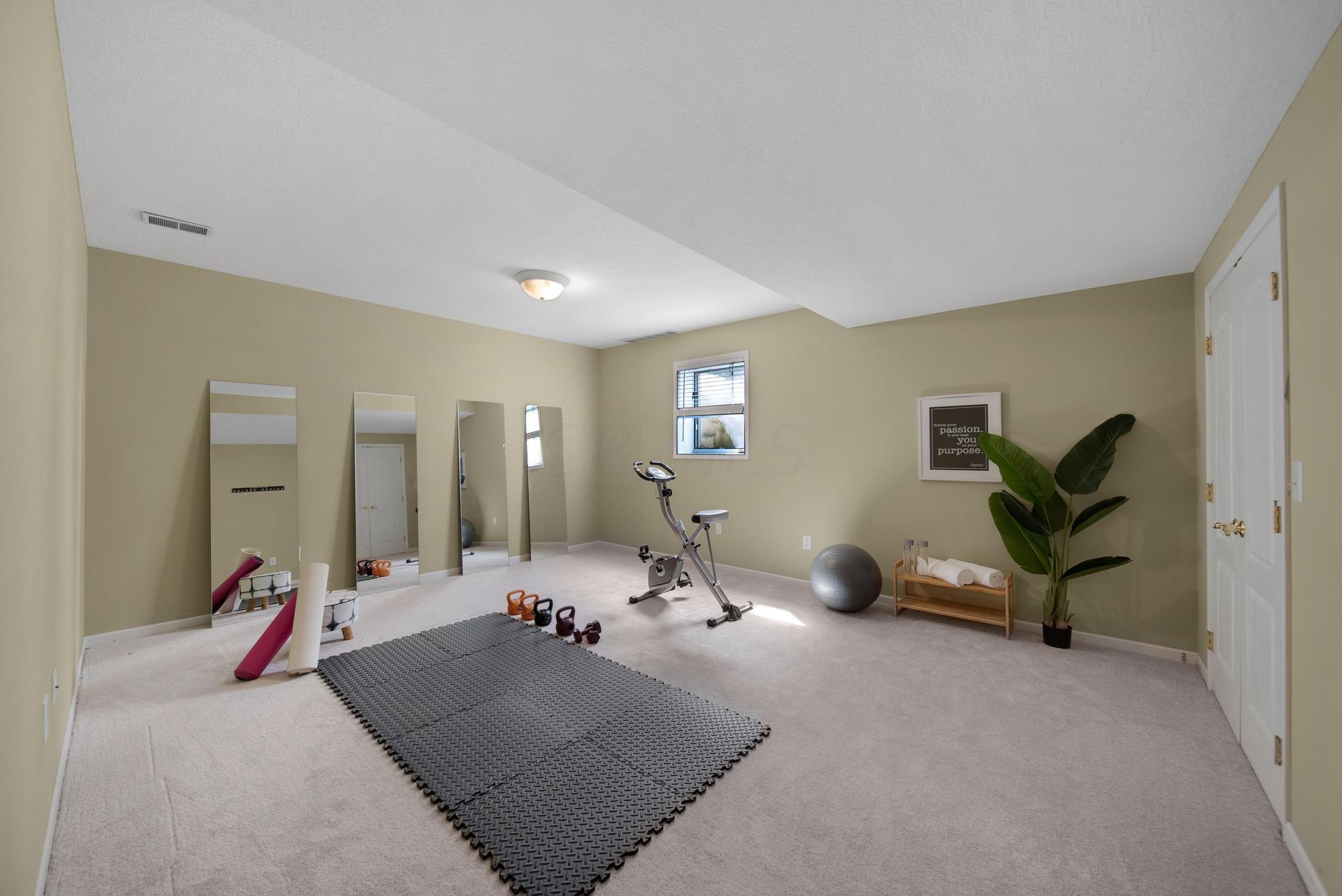 8075 Rookery Way Westerville, OH 43082 - Photo 42 of 55 Lower Level Gym/Bedroom