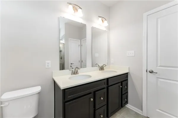 a bathroom with a sink and a toilet