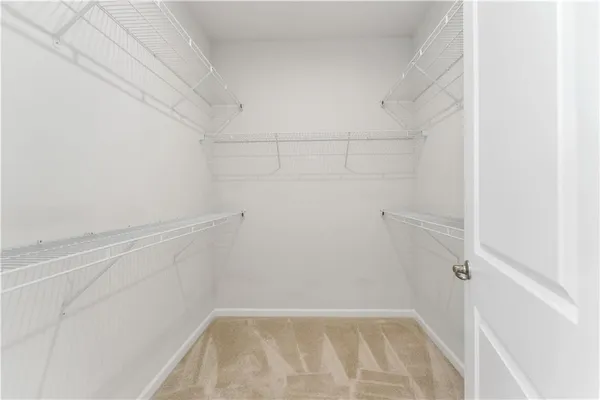 a view of a room with racks on the wall