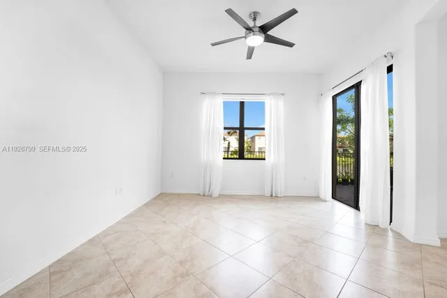 a kitchen with stainless steel appliances granite countertop a refrigerator and a microwave
