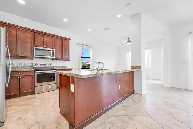 a view of staircase with white walls