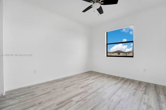 a view of small space with wooden floor