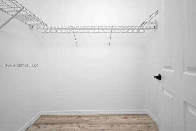 a bathroom with a granite countertop sink toilet and bathtub