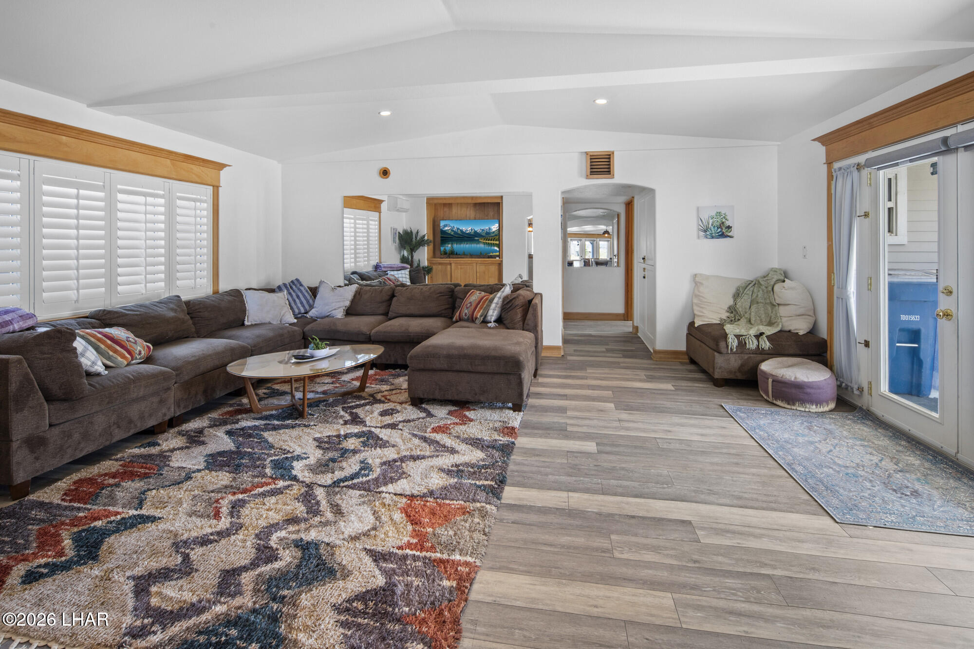 7870 Riverside Drive Parker, AZ 85344 - Photo 18 of 88 a living room with furniture and wooden floor