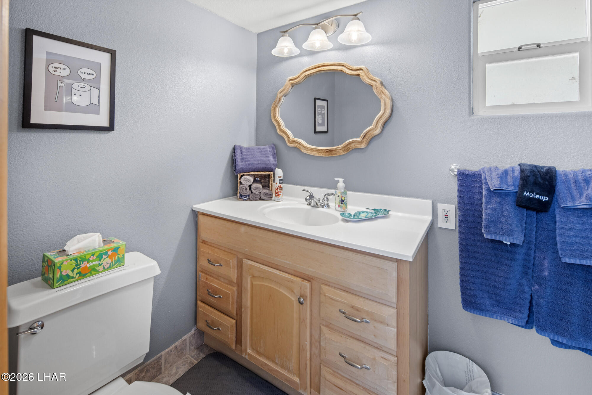 7870 Riverside Drive Parker, AZ 85344 - Photo 27 of 88 a bathroom with a sink mirror and vanity