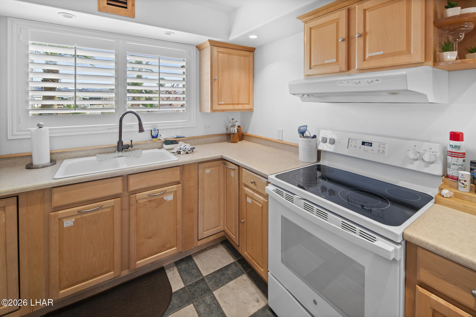 7870 Riverside Drive Parker, AZ 85344 - Photo 37 of 88 a view of a kitchen with sink and cabinets
