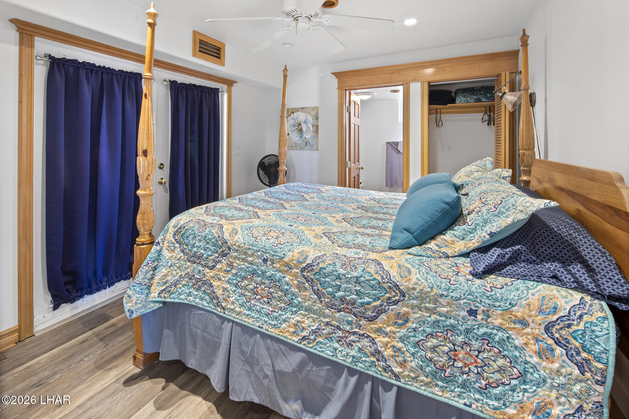 7870 Riverside Drive Parker, AZ 85344 - Photo 42 of 88 a bedroom with a bed and a dresser