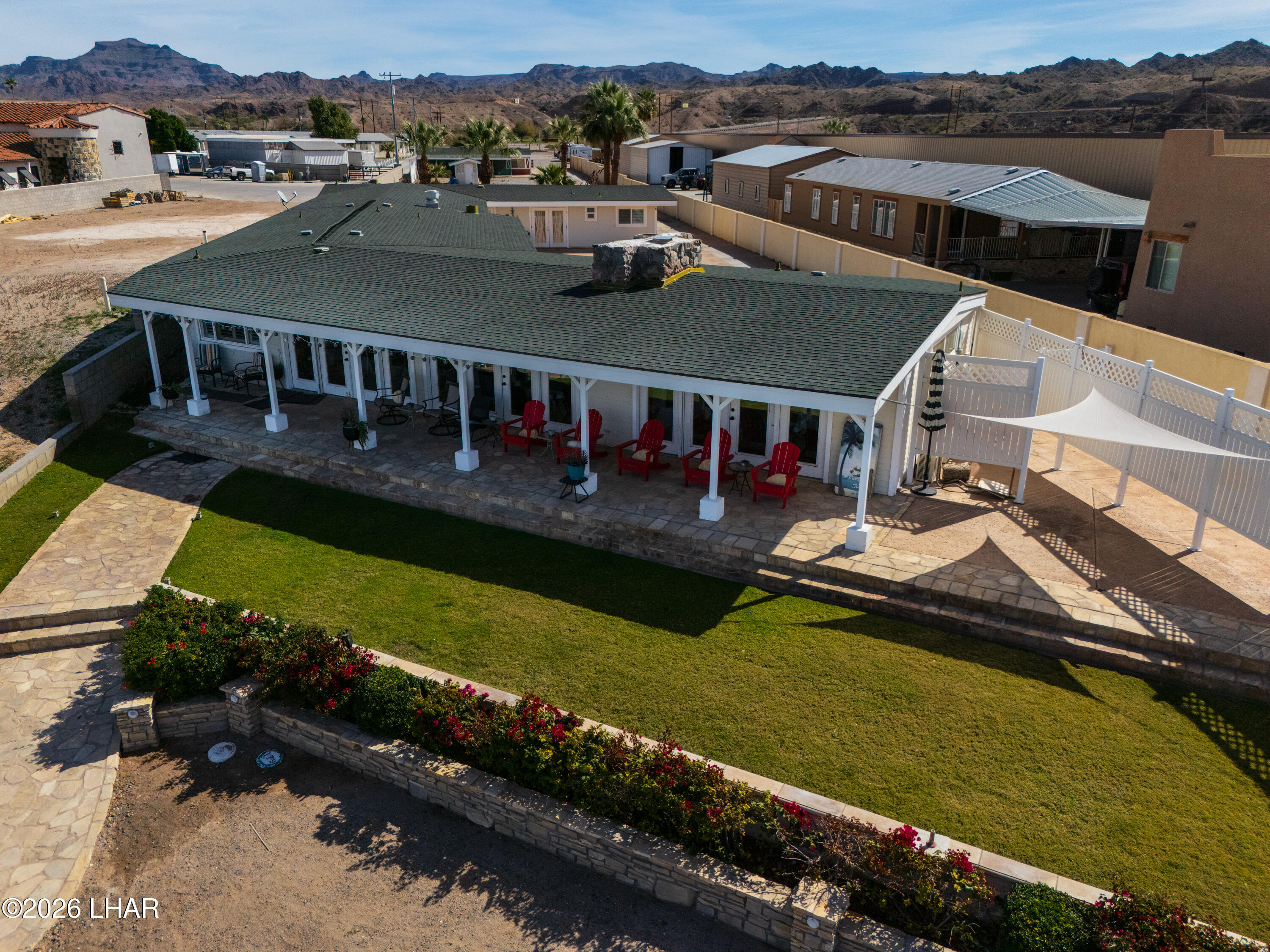 7870 Riverside Drive Parker, AZ 85344 - Photo 52 of 88 an aerial view of a house with a garden