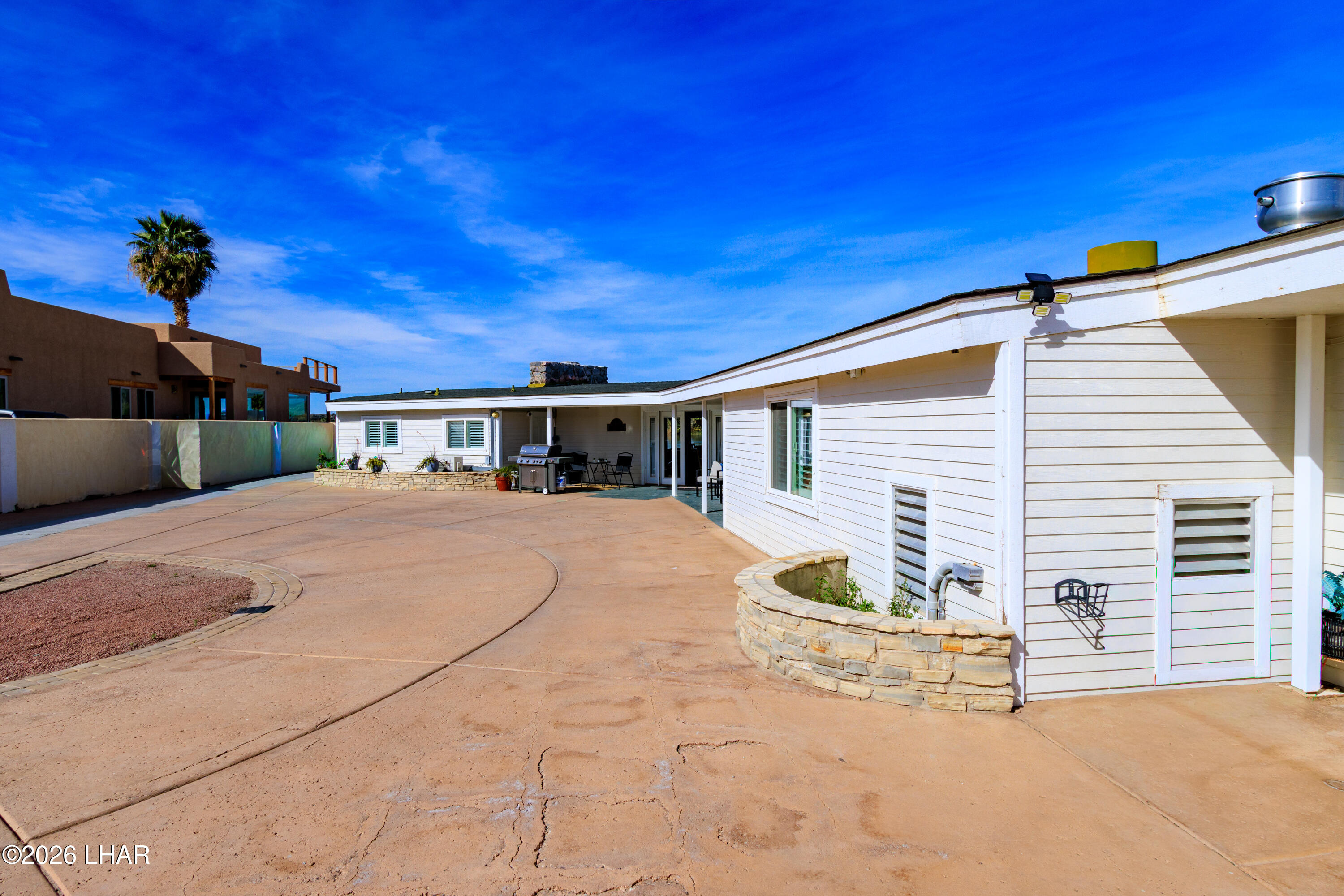 7870 Riverside Drive Parker, AZ 85344 - Photo 62 of 88 a view of a house with a patio