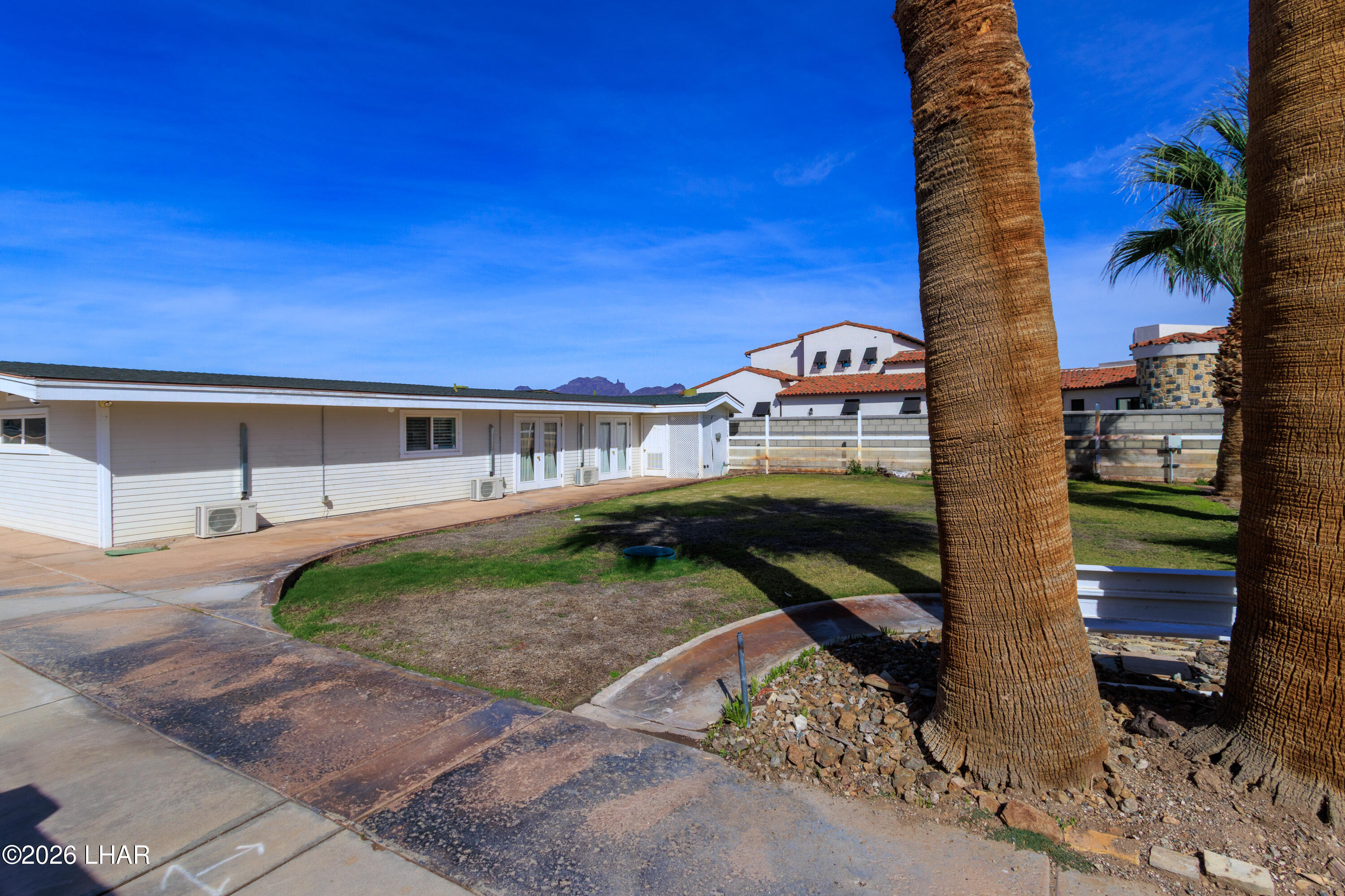 7870 Riverside Drive Parker, AZ 85344 - Photo 66 of 88 a front view of a house with a yard