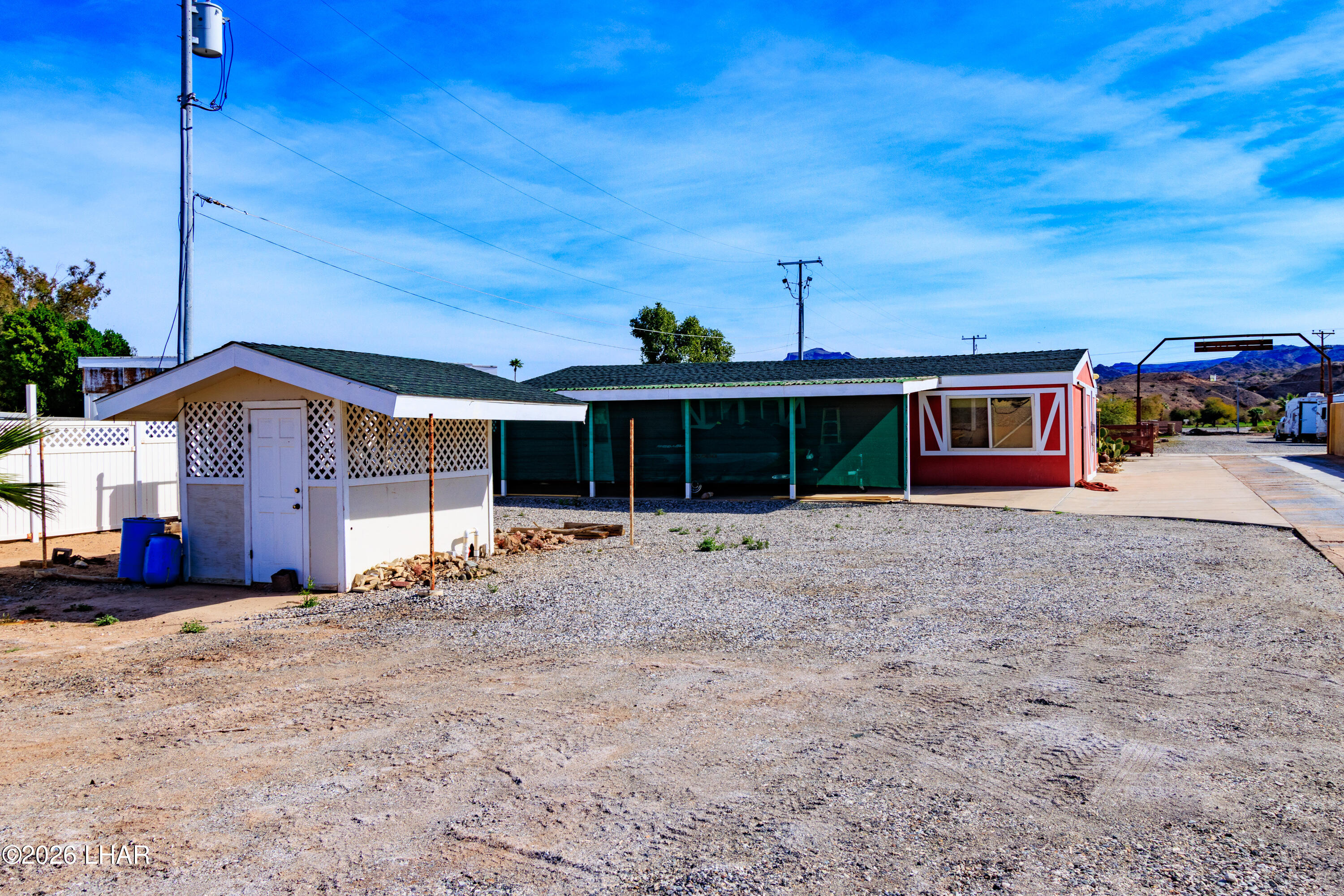 7870 Riverside Drive Parker, AZ 85344 - Photo 69 of 88 a front view of a house with a yard