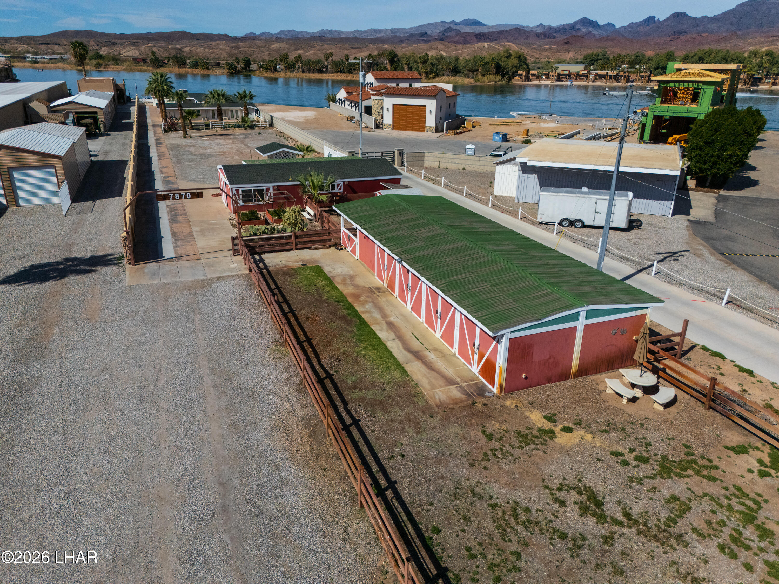 7870 Riverside Drive Parker, AZ 85344 - Photo 78 of 88 an aerial view of a house with a lake view