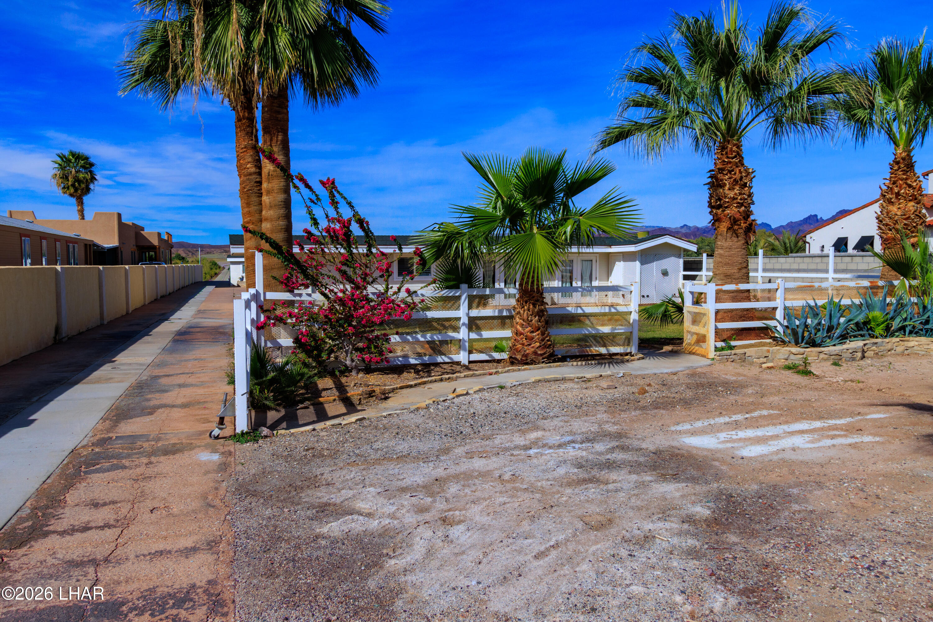7870 Riverside Drive Parker, AZ 85344 - Photo 83 of 88 a view of road with palm trees