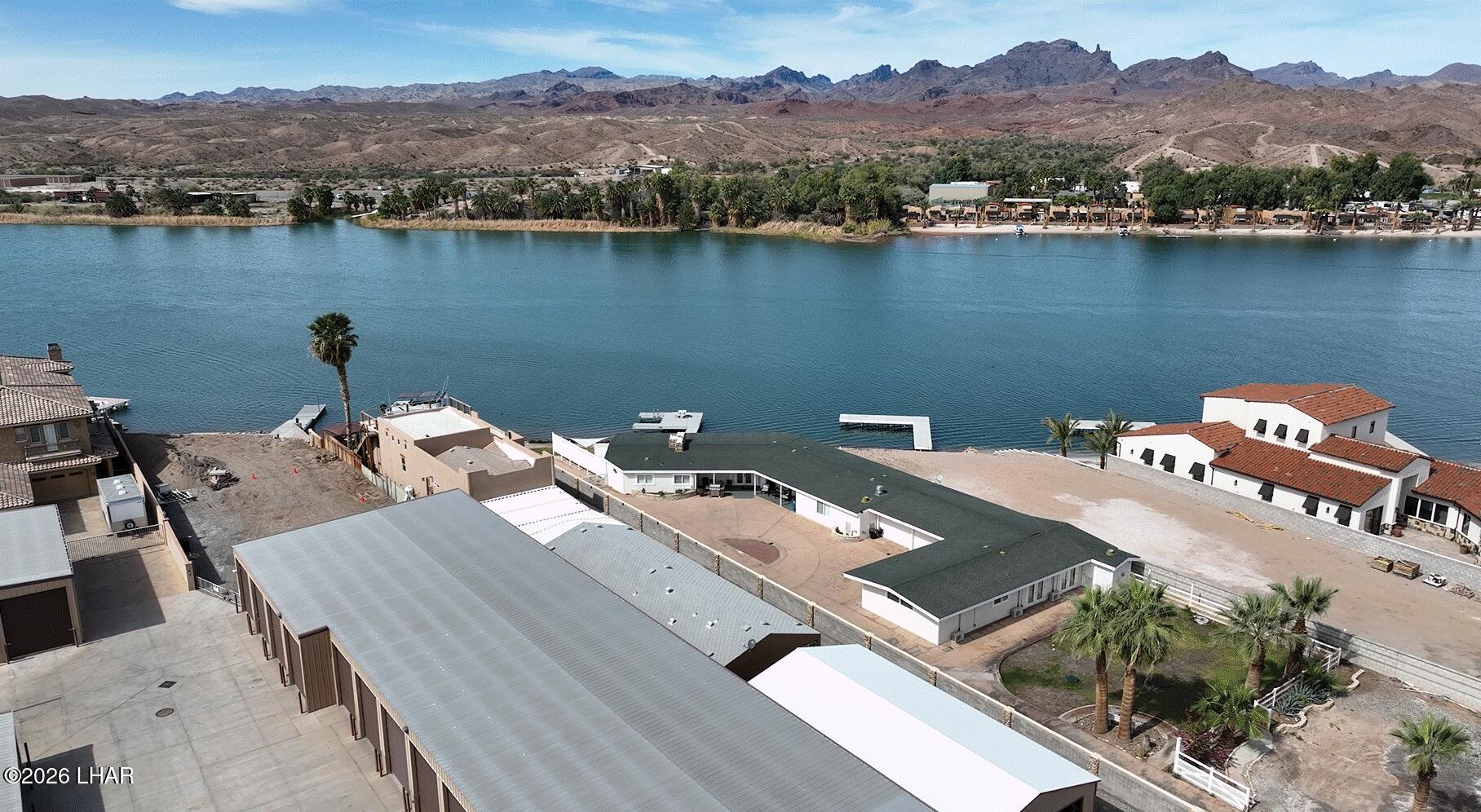 7870 Riverside Drive Parker, AZ 85344 - Photo 85 of 88 an aerial view of a house with wooden floor and lake view