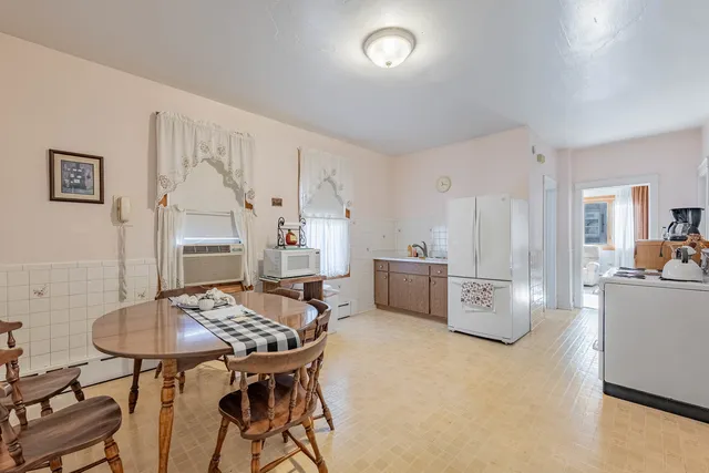 a view of a dining room with furniture
