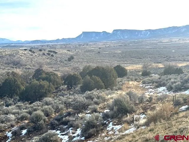 a view of mountain view with trees