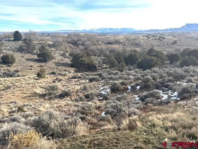 a view of lake with mountain