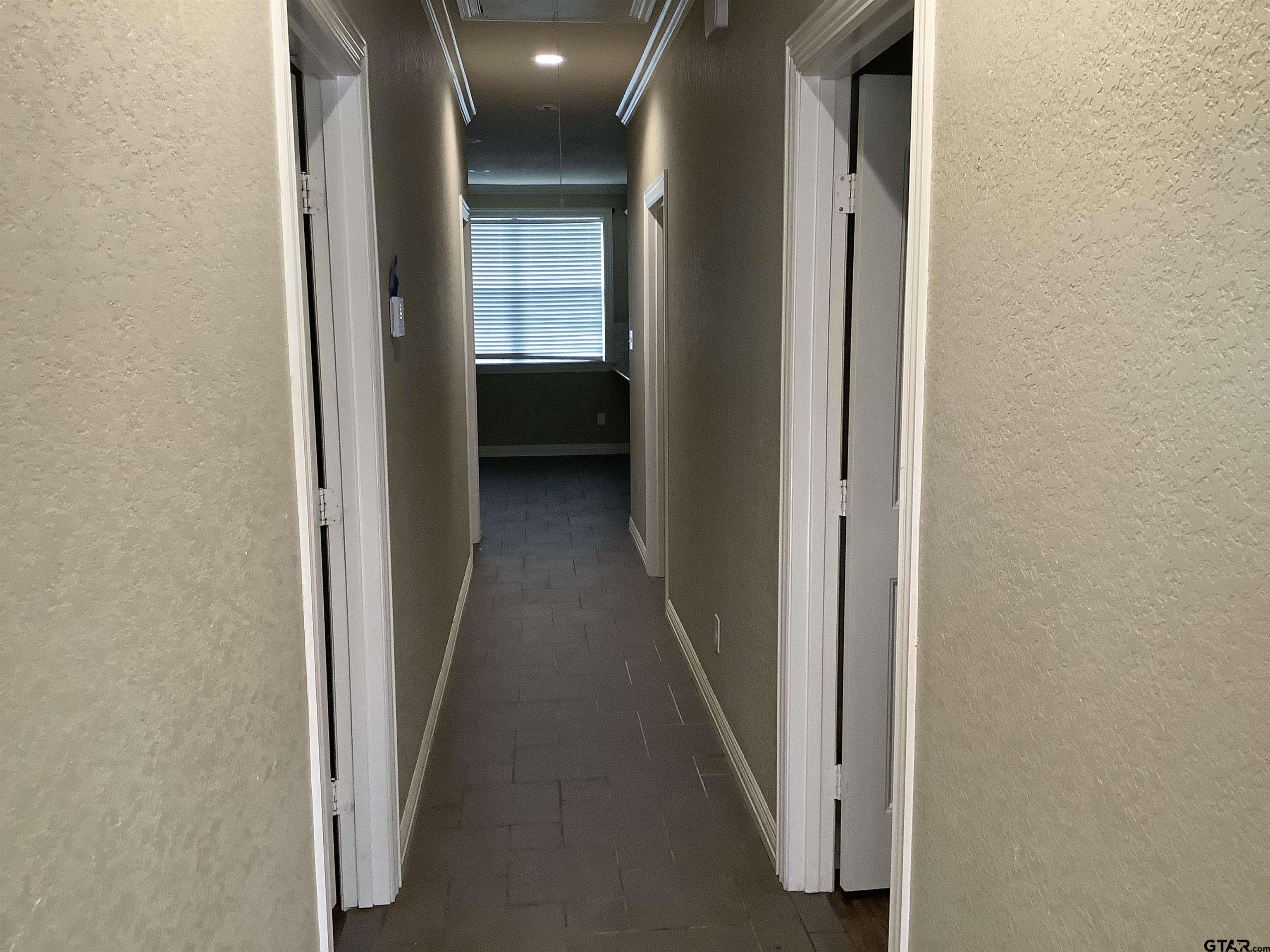 11621 FM 848 Tyler, TX 75707 - Photo 5 of 15 a view of a hallway with a room