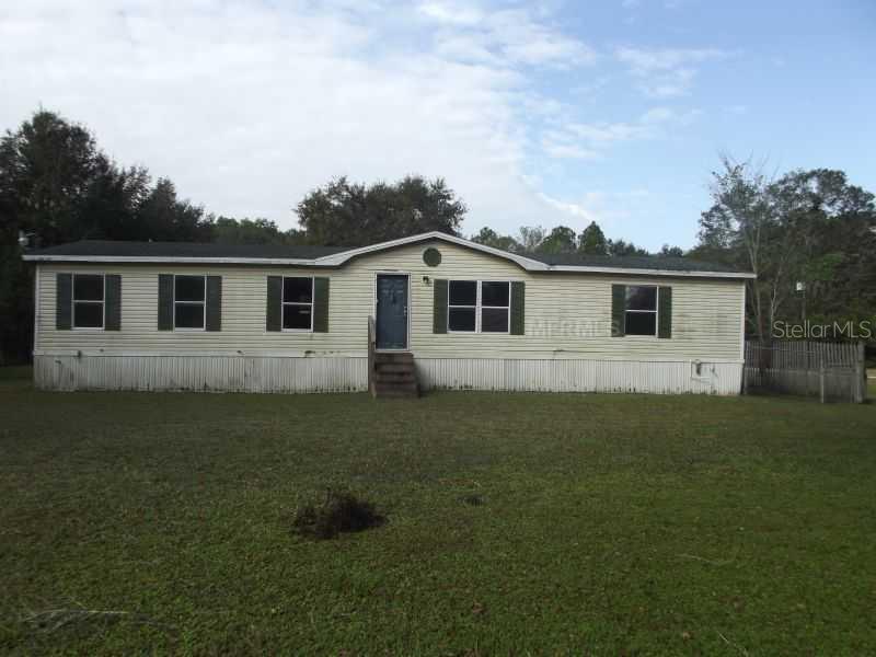 1309 Crystal Springs Road Zephyrhills, FL 33540 - Photo 1 of 1 Exterior Front