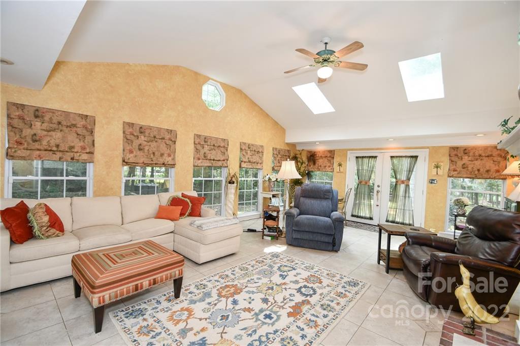 9101 Bartlett Road Mint Hill, NC 28227 - Photo 14 of 20 a living room with furniture and large windows