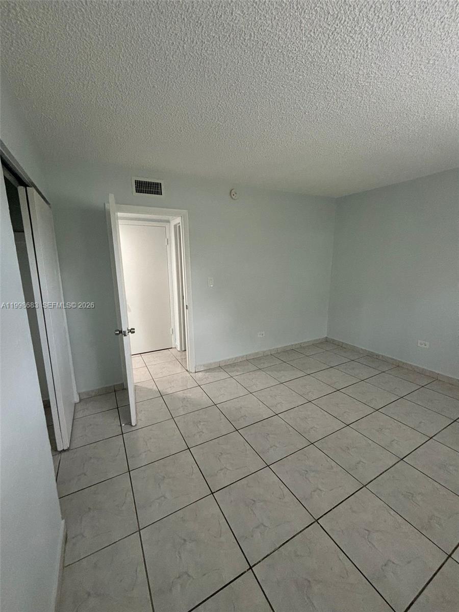 8101 Southwest 73rd Avenue, Unit 1 Miami, FL 33143 - Photo 14 of 52 an empty room with a bathroom