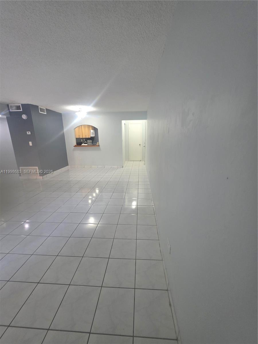 8101 Southwest 73rd Avenue, Unit 1 Miami, FL 33143 - Photo 28 of 52 a view of a livingroom and a fireplace