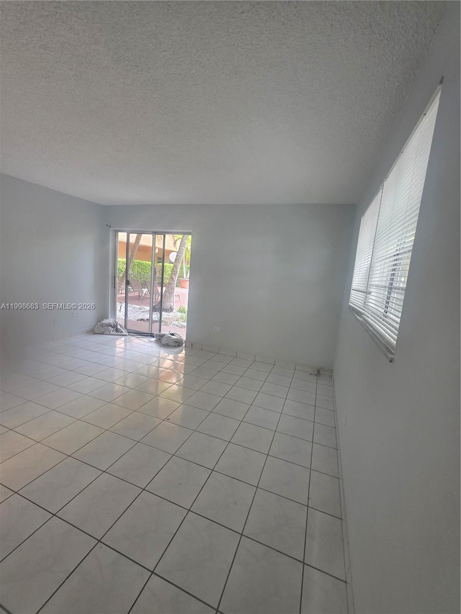 8101 Southwest 73rd Avenue, Unit 1 Miami, FL 33143 - Photo 41 of 52 an empty room with windows