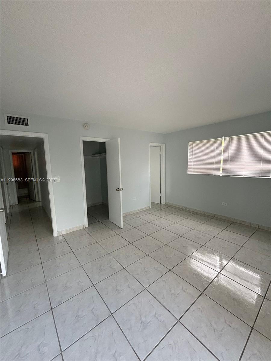 8101 Southwest 73rd Avenue, Unit 1 Miami, FL 33143 - Photo 9 of 52 a view of room and window