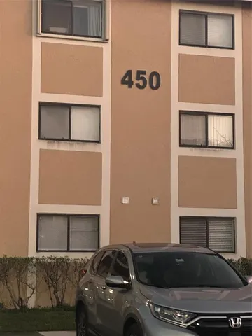 a car parked in front of a building