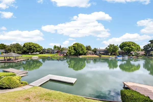 a view of a lake with a houses